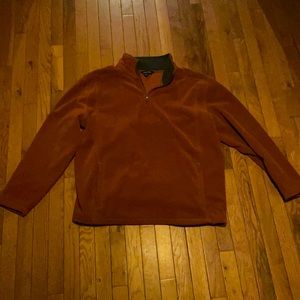 Men’s 1/4 zip fleece burnt orange.